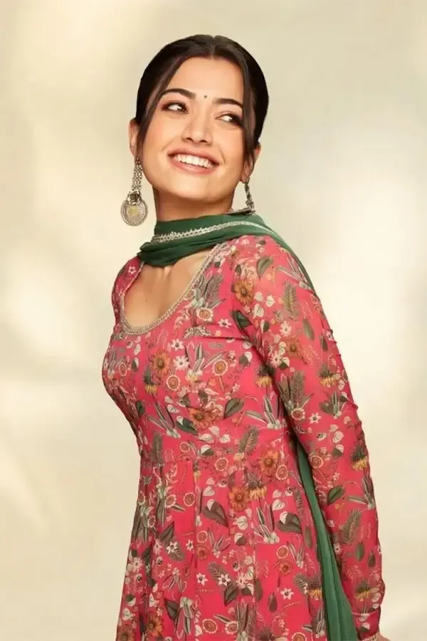 INDIAN GIRL RASHMIKA MANDANNA CURLY HAIR IMAGES IN MAROON DRESS 3